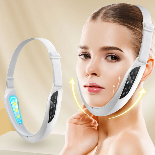 Woman using an electric V-face toning device with LED microcurrent massage strap for chin and jawline